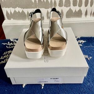Stella McCartney
Vegetarian Patent Leather Studded Accents
Slingback Sandals